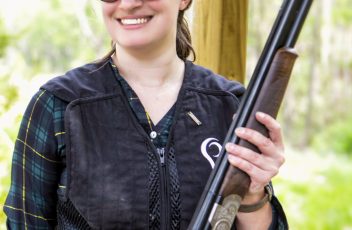 Woman with shotgun